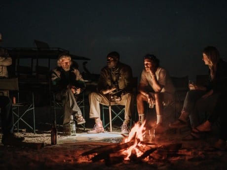 Africa Expeditions_Botswana_camp-fire-gu